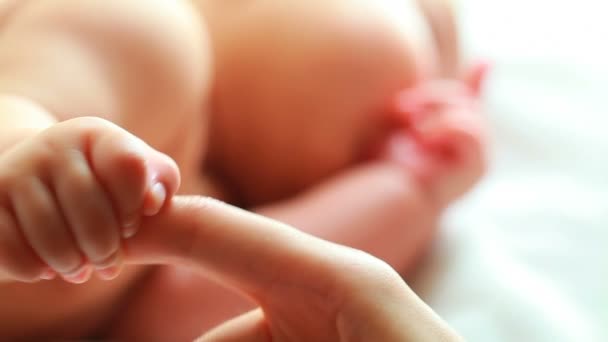 Lovely baby sleeping, holding moms hand — Stock Video