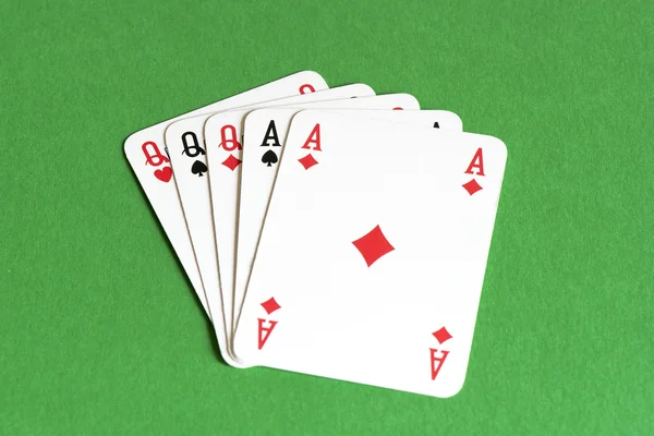 Playing card on green table, Full house — Stock Photo, Image