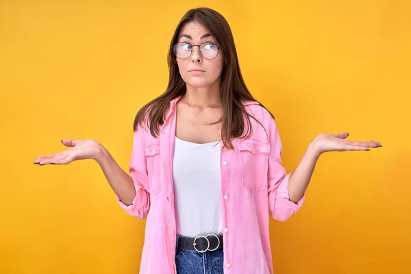 Young Woman Glasses Makes Decision Doubtful Face Chooses Two Things — Foto Stock