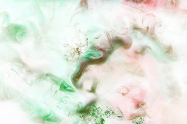 Renkli soyut arka plan, suda parlak karışım boyalar, canlı dans renkleri, suyun altında dönen duman. Aroma şehvetli konsept, narin parfüm