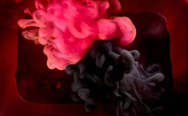 Kırmızı siyah pigment dönen mürekkep soyut arkaplan, suyun altında sıvı duman boyası