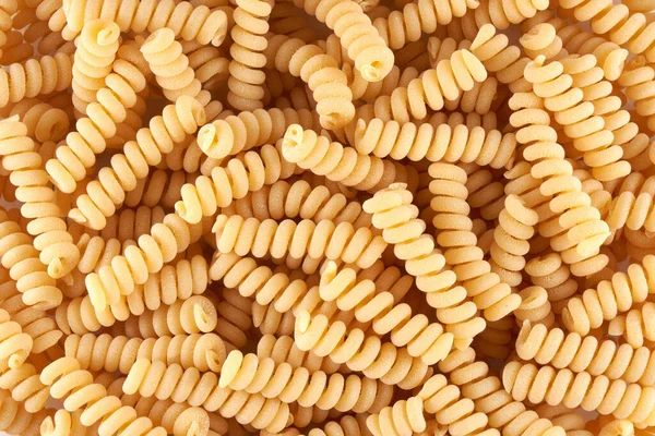 Spiralnudlar Närbild Bakgrund Pasta Och Makaroner — Stockfoto