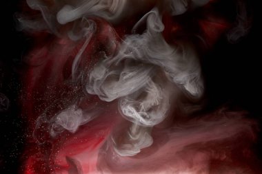 Kırmızı siyah pigment dönen mürekkep soyut arkaplan, suyun altında sıvı duman boyası