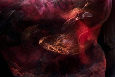 Kırmızı siyah pigment dönen mürekkep soyut arkaplan, suyun altında sıvı duman boyası