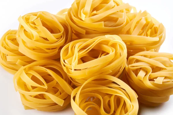 Italiaanse Pasta Nest Close Fettuccine Achtergrond — Stockfoto