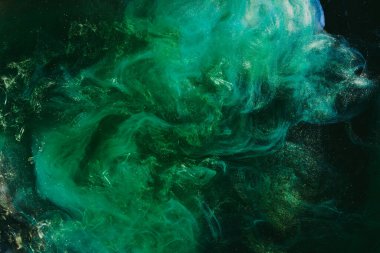 Soyut yeşil mavi arkaplan. Değişken renkli boya akışı, renkli sıvı sanat.