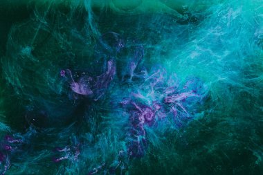 Abstract colorful smoke background. Moving flow of dark purple green paints, fluid art