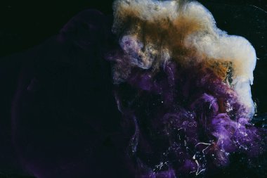 Abstract fluid art background. Moving flow of purple gold paints, dark space sky