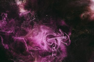 Abstract fluid art background. Moving flow of purple gold paints, dark space sky