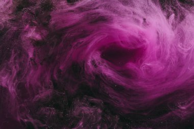 Abstract fluid art background. Moving flow of purple gold paints, dark space sky
