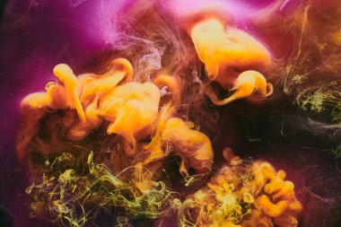 Abstract colorful smoke background. Moving flow of purple yellow paints, dark fluid art