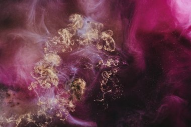 Abstract colorful smoke, dark background. Moving flow of pink paints, fluid art