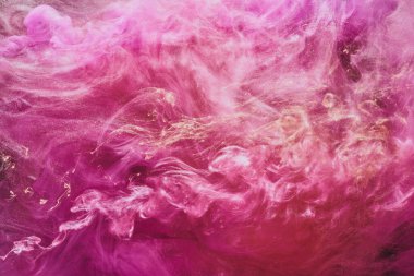 Abstract colorful smoke, dark background. Moving flow of pink paints, fluid art