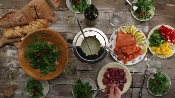 Fondue party served on table — Stock Video