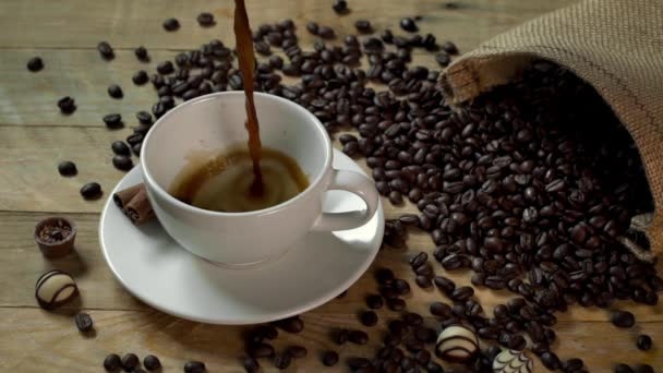 Hot Black Coffee Poured into Coffee Cup in Slow Motion — Stock Video