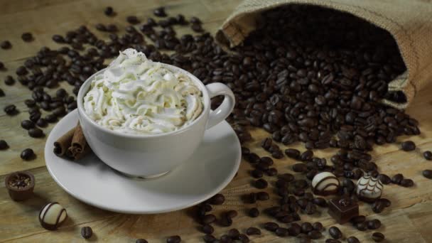 Cinnamon Sprinkled on Cafe Latte — Stock Video