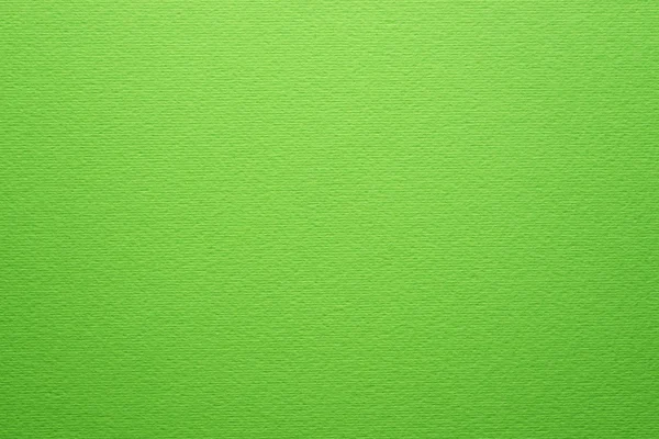 Barevný papír, jasně zelená, přirozenou texturou pozadí — Stock fotografie