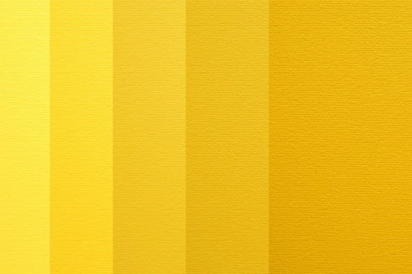 Papel texturizado de diseño plano, degradado lineal de tono de color amarillo — Foto de Stock