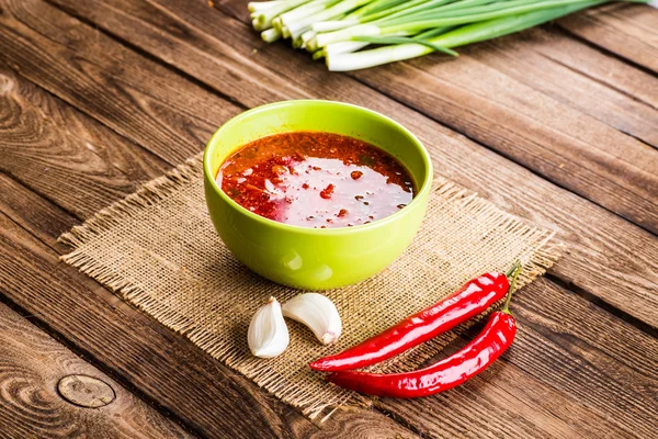 Ukrainian beetroot soup - borscht, on napkin, on wooden backgrou — Stock Photo, Image
