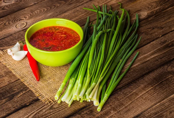 Ukrainian beetroot soup - borscht, on napkin, on wooden backgrou — Stock Photo, Image