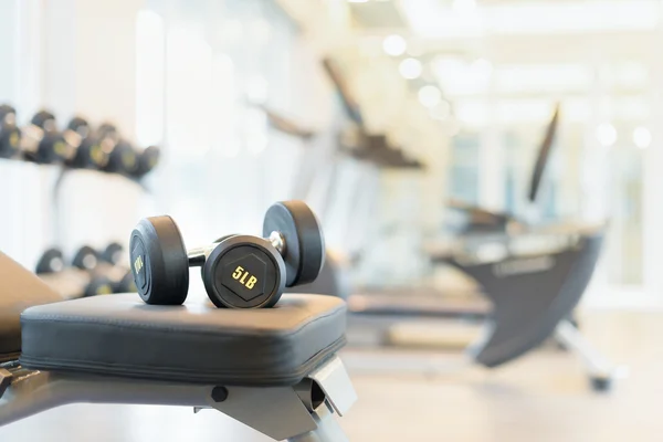 dumbbell on the exercise bench