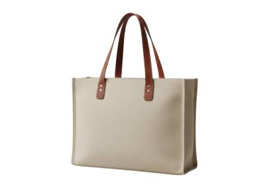 Görüntü, içinde sağlam kahverengi deri sapları ve basit ama sofistike bir tasarımı olan şık bir bej çanta gösteriyor. Çantanın geniş bir ana bölmesi var ve dayanıklı, desenli bir kumaştan yapılmış gibi görünüyor. Günlük kullanım için ideal.