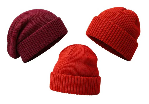 Bu resimde kırmızının değişik tonlarında örülmüş üç bere var. Sol üst berenin kenarları katlanmış koyu bir bordo, sağ beresi düz kenarlı parlak bir kırmızı ve alt beresi de kaburga desenli zengin bir kestane rengi.