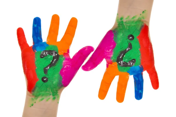 Duas mãos no contrário colorido com um ponto de interrogação no centro da palma da mão — Fotografia de Stock