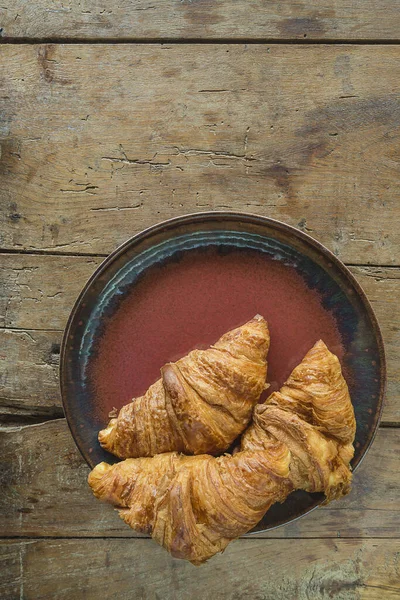 French croissants on plat and rustic wooden non paint background — Stock Image French Croissants Plat Rustic Wooden Non Paint Background Stock Picture