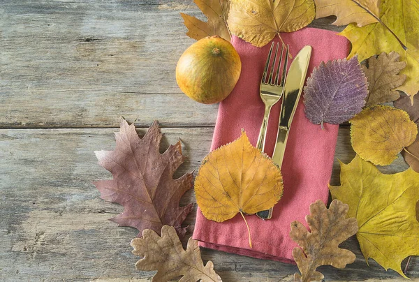 Autumn holiday table setting. Table setting for Thanksgiving dinner