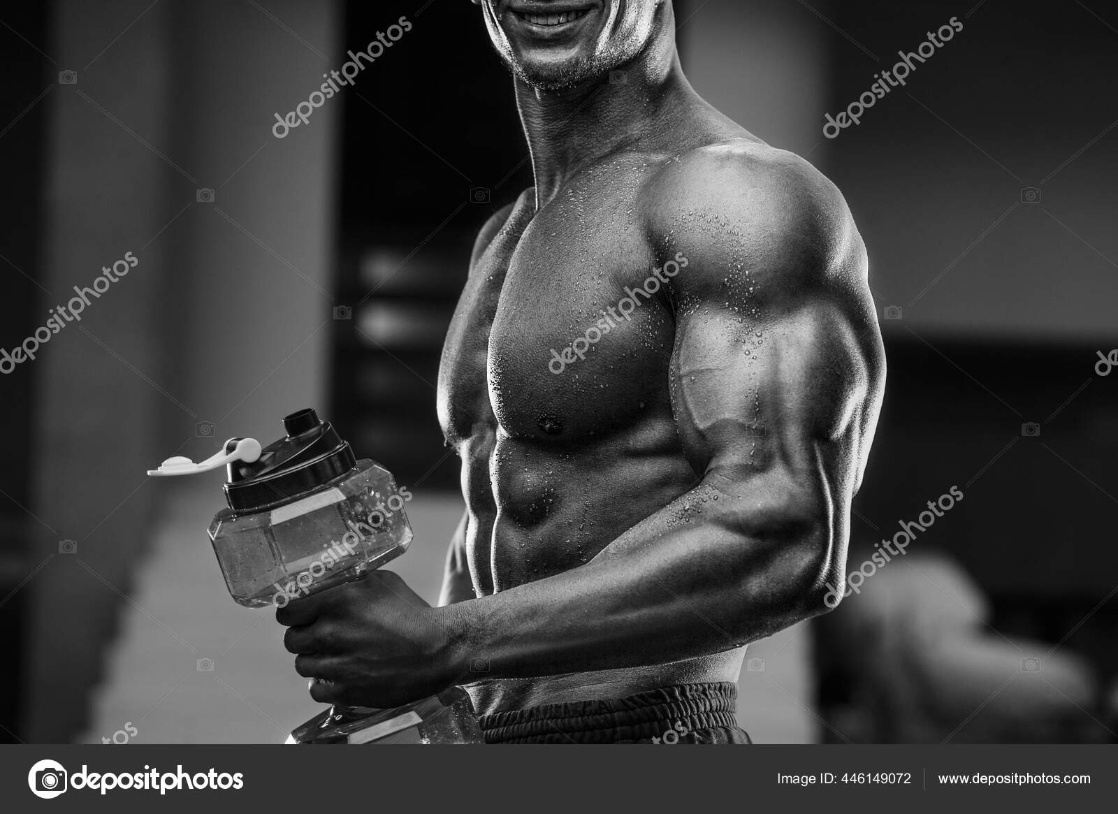 Fitness Man In Gym Drinking Water After Workout. Fitness And Bodybuilding  Healthy Background. Caucasian Men Doing Exercises In Gym Naked Torso. Water  Bottle And Supplements Nutrition Concept Stock Photo, Picture and Royalty