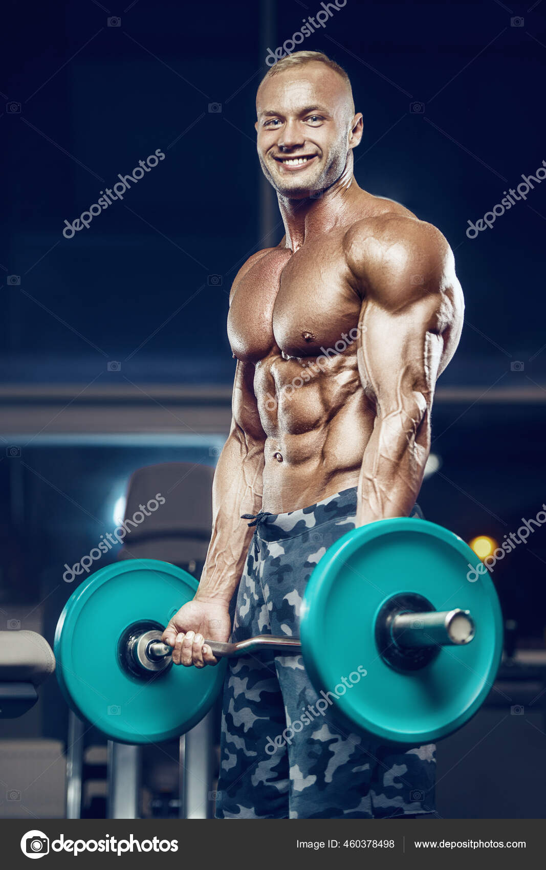 Fit Man Training Training Arm Muscles Gym Pumping Biceps Exercise Stock