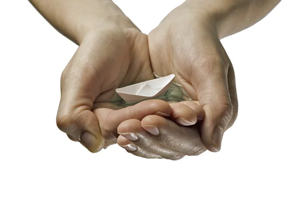 Paper boat in hands — Stock Photo, Image