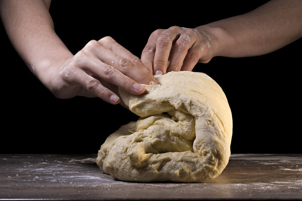 hands knead the dough