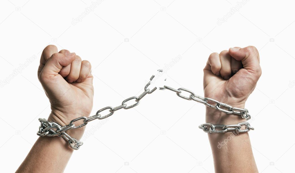 Man breaks the chains and gains freedom. The concept of gaining freedom.