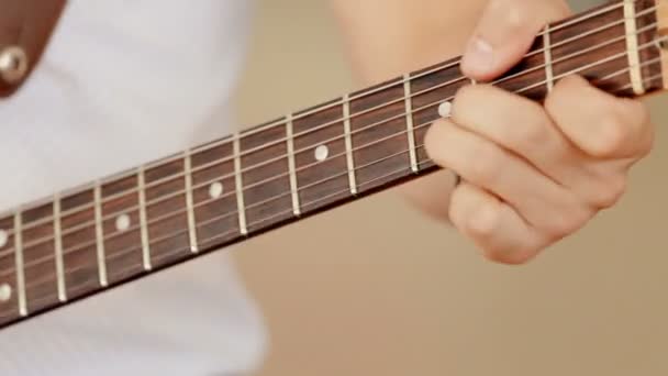 Close up shot man playing guitar — Stok Video