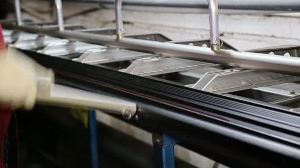Close up shot operator bending metal sheet by sheet bending machine — Stock Video