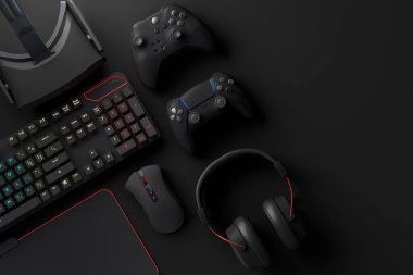 Oyun alanının üst görüntüsü ve fare, klavye, joystick, kulaklık, siyah masa arka planında VR kulaklık gibi teçhizatlar. Canlı yayın konsepti için aksesuarların 3D yorumlaması
