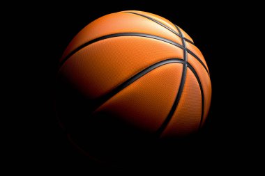 Siyah zemin üzerinde izole edilmiş basketbol topu