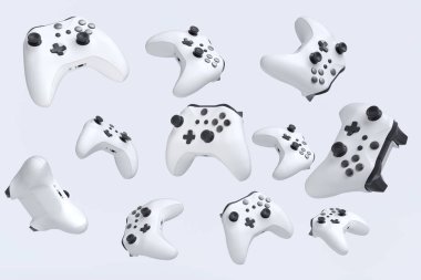 Uçan oyun joystickleri ya da beyaz arkaplanda oyun yastıkları