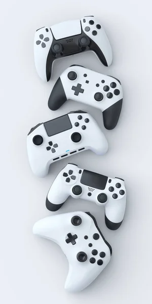 Set of lying gamer joysticks or gamepads on white background — Stock Photo, Image