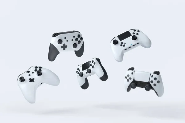 Repülő játékos joysticks vagy gamepads fehér alapon — Stock Fotó