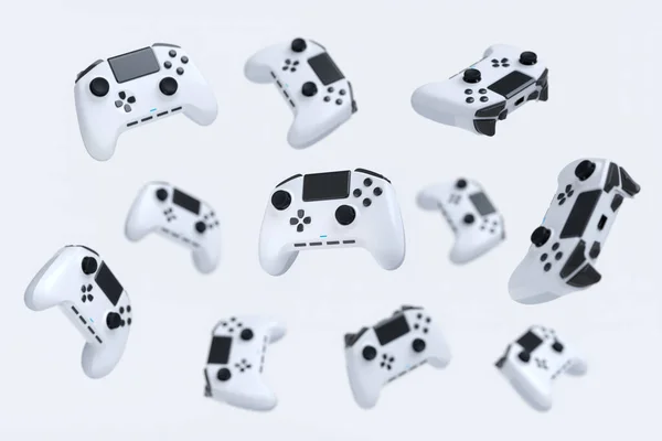 Joysticks do jogador voador ou gamepads no fundo branco com borrão — Fotografia de Stock