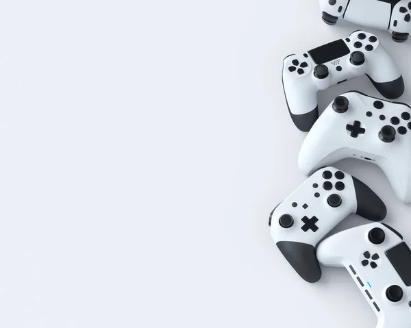 Conjunto de joysticks gamer deitado ou gamepads no fundo branco — Fotografia de Stock