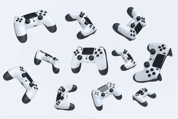 Repülő játékos joysticks vagy gamepads fehér alapon — Stock Fotó