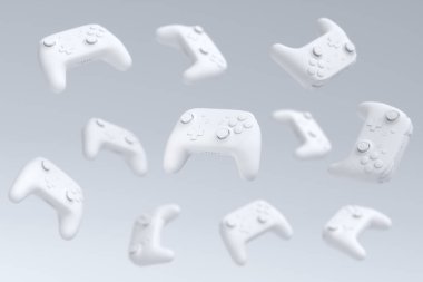 Uçan oyun joystickleri veya beyaz arka planda bulanık oyun blokları