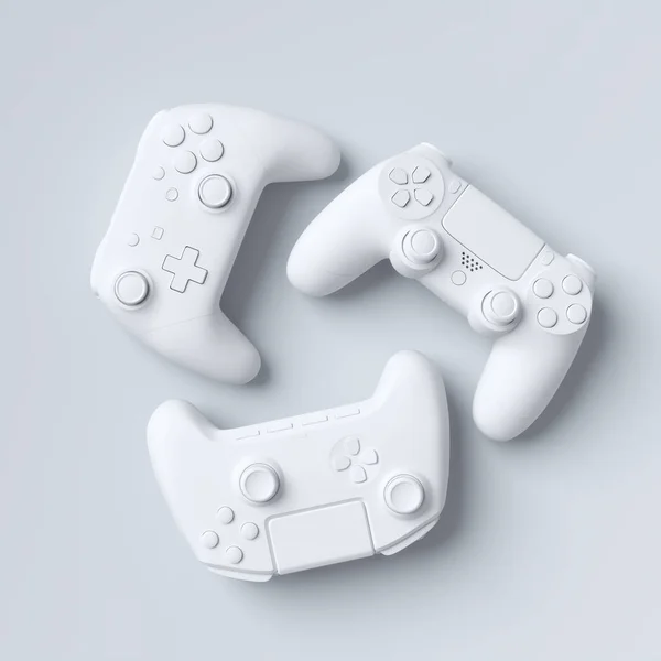 Conjunto de joysticks gamer deitado ou gamepads no fundo branco — Fotografia de Stock