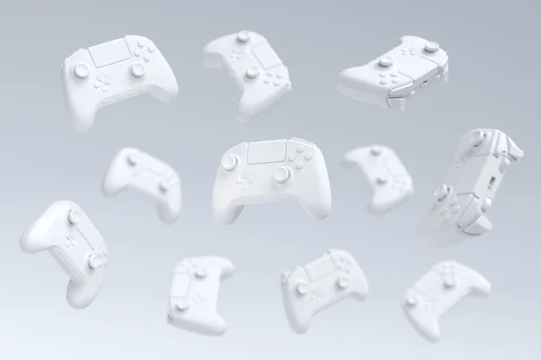 Flying gamer joysticks of gamepads op witte achtergrond met vervaging — Stockfoto