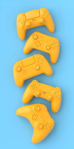 Juego de joysticks o gamepads mentirosos sobre fondo azul y amarillo —  Fotos de Stock