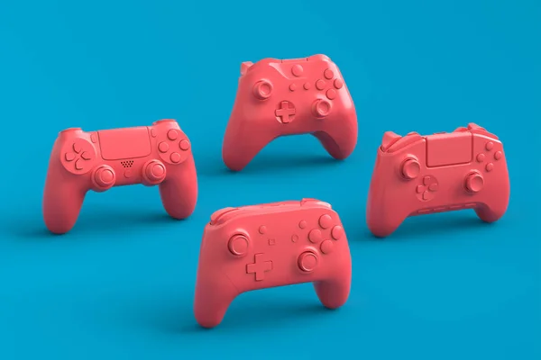 Conjunto de joysticks gamer em pé ou gamepads em fundo azul e rosa — Fotografia de Stock